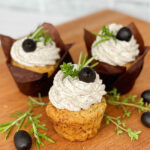 Savory Muffins with cream cheese frosting on display