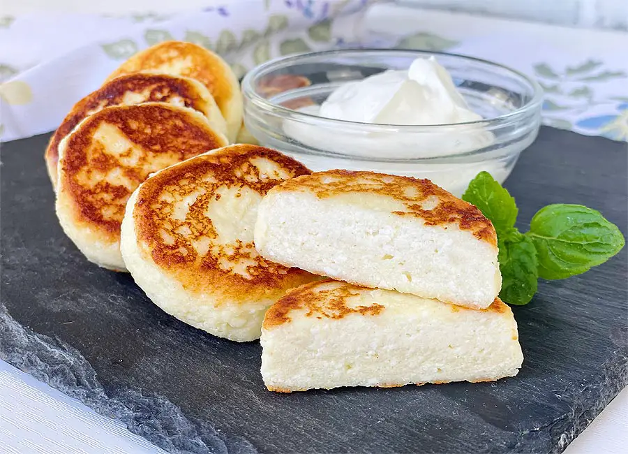 Cheese pancakes on the plate showing inside texture