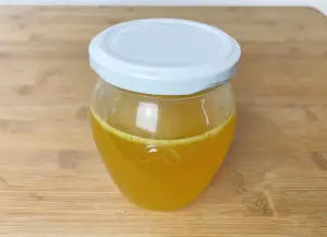 A jar with pasiion fruit symple syrup
