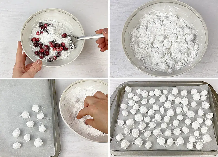 Coating cranberries with powdered sugar and placing them on the baking sheet